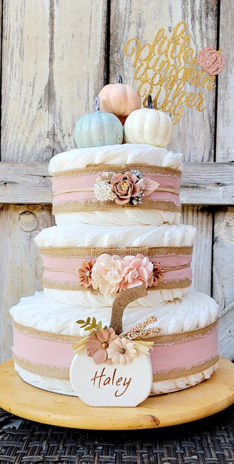 Fall Candy Bar Ideas, Diaper Cake Pumpkin Theme, Pink Pumpkin Shower Ideas, Baby Girl Baby Shower Themes Fall, Fall Baby Shower Diaper Cakes, Pink Pumpkin Baby Shower Centerpieces, Diaper Cake Fall Theme, A Little Pumpkin Baby Shower Theme Pink, Little Pumpkin Girl Baby Shower Ideas