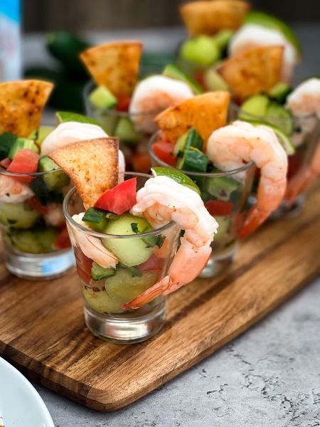 Mexican style shrimp ceviche with fresh cucumbers, melon, and tomatoes served in appetizer sized portions. Ceviche Cups Appetizers, Shrimp Ceviche Appetizer, Mexican Style Shrimp, Hors Devours, Individual Appetizers, Melon Salad, Mexican Appetizers, Shrimp Appetizers, Shrimp Ceviche