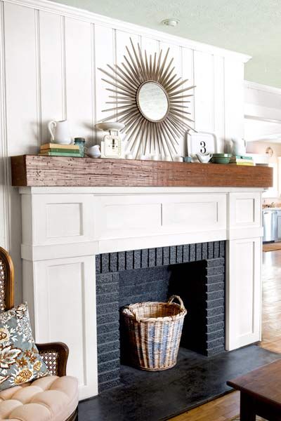 A fireplace should steal the show in a living room, not drag it down. At Kevin and Layla Palmer's 1950s home, in Prattville, Alabama, the gathering space's dreary gray fireplace was more homely than homey. And once the room's knotty-pine walls got a much-needed coat of cream-colored paint and the wall-to-wall carpet was pulled up to reveal warm oak floors, the fireplace became even more of an eyesore. Learn how the homeowners doctored up the existing mantel with this rustic new ma... Faux Foyer, Fireplace Facing, Fireplace Redo, Brick Hearth, Painted Brick Fireplaces, Fake Fireplace, Fireplace Update, Серая Кухня, Wood Mantle