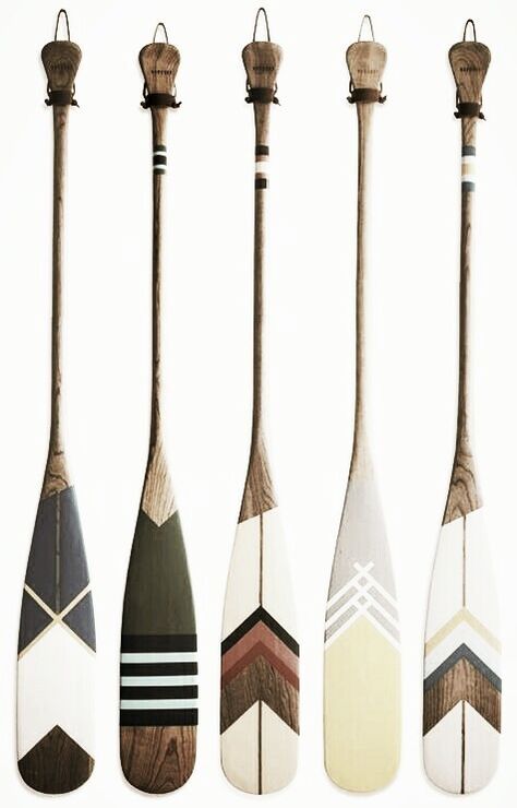 Oars On Wall Decor Ideas Living Room, Paddles On Wall Decor, Boat Ore Decor Ideas, Decorating With Oars Paddles, Hanging Boat Oars On Wall, Canoe Paddle Designs, Decorating With Oars, Painted Boat Oars, Painted Boat Paddles