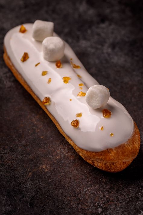 Sweet Potato Marshmallow Glazed Eclairs | Southern FATTY Eclair Glaze, Pumpkin Eclairs, Fancy Eclairs, Marshmallow Glaze, Potato Pastry, Sweet Potato Marshmallow, Cream Buns, Icing Glaze, Marshmallow Icing