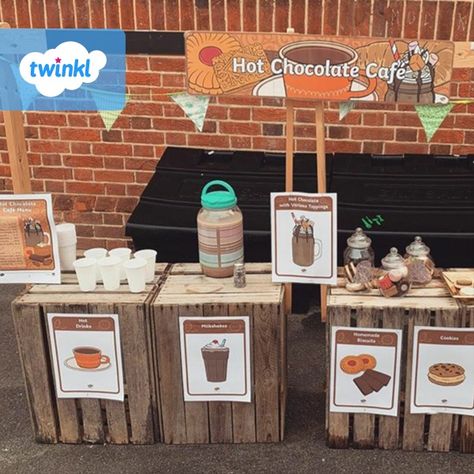 We're obsessed with this hot chocolate cafe that Lampton Park Preschool have created 😍 The campfire is a great final touch too 🔥 We’ll be over for a (socially distanced) cup of hot chocolate soon 😉💙  If you're inspired to create your own, click to download our Hot Chocolate Cafe role play pack, it has everything you need to set up shop. 

#hotchocolate #cafe #teachingresources #teaching #teacher #twinkl #twinklresources #eyfs #earlyyears #eyfsteacher #classroomideas #classroleplay #parents Cafe Eyfs Role Play, Preschool Cafe Dramatic Play, Coffee Shop Role Play Eyfs, Hot Chocolate Role Play Eyfs, Christmas Roleplay Eyfs, Cafe Role Play Area Eyfs, Cafe Role Play Area, Cafe Role Play, Preschool Experiences