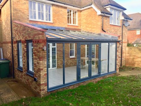 Bespoke modern grey aluminium lean to conservatory with brick side walls Modern Lean To Conservatory, Half Brick Conservatory, Brick Conservatory, Modern Conservatory Ideas, Small Orangery Extension, Lean To Extension, Conservatory Home, Small Conservatory, Modern Conservatory