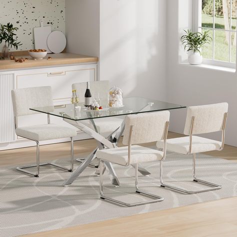 PRICES MAY VARY. Modern glass dining table set: This 5-piece kitchen table set includes a modern glass dining table and 4 upholstered dining chairs. The modern design of the dining table and chairs are spacious enough to easily seat 4 people in a small apartment. Our glass kitchen table is clear glass table top and chrome-plated metal legs. It creates a bright and spacious feel to your dining space with spacious table top that is easy to clean and perfect for families of 4 people. Modern tempere Small Glass Dining Table, Modern Glass Dining Table, Glass Kitchen Tables, Glass Dining Table Set, Contemporary Glass Dining Table, Kitchen Table And Chairs, Chairs For Kitchen, Glass Dining Room Table, Modern Kitchen Tables