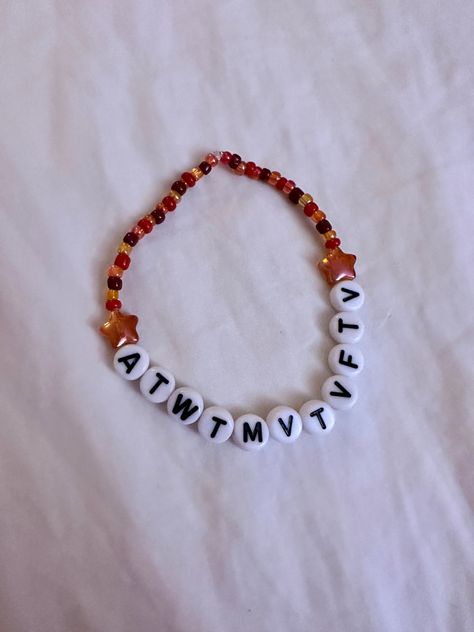 Orange Eras Tour Bracelet, All Too Well Bracelet Taylor Swift, Unhinged Eras Tour Bracelet Ideas, Atwtmvtvftv Bracelet, Eras Tour Bracelets Folklore, Speak Now Bracelet Taylor Swift, All Too Well Friendship Bracelet, Red Friendship Bracelet Taylor Swift, Lover Friendship Bracelet Taylor Swift