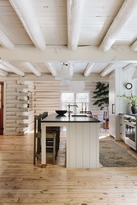 White Log Cabin Exterior, Log Cabin Kitchen Ideas, The Established Home, Michigan Cabin, White Log Cabin, Established Home, Modern Log Home, Log Cabin Kitchen, Stores Design