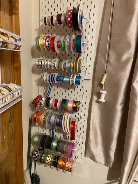 My ribbon spools look so pretty displayed on Ikea Skadis pegboard, using reel holders. You can never have too kuch ribbon Button Storage, Skadis Pegboard, Ikea Skadis, Ribbon Holders, Ribbon Storage, Room Organisation, Spool Holder, Sewing Room Organization, Craft Room Storage