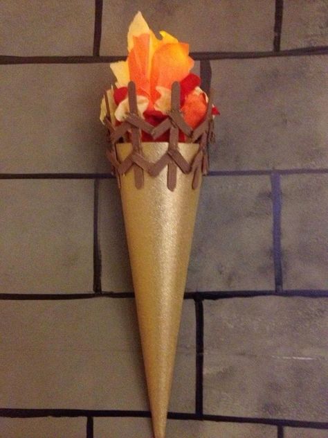 Fake Torch Diy, Medieval Castle Decorations, Diy Torch Prop, Keepers Of The Kingdom Vbs Decorations, Diy Torch, Keepers Of The Kingdom Vbs, Torch Craft, Medieval Decoration, Kingdom Vbs