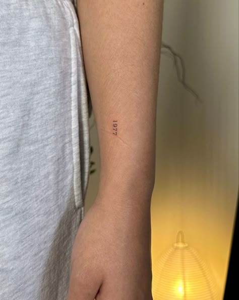 Birth Year Roman Numeral Tattoo, 70 Times 7 Tattoo, Small Number Tattoo Placement, 1936 Tattoo, Dainty Family Tattoos, Date Tattoo Fonts, Birthyear Tattoo Ideas, Parents Birth Year Tattoo, 11:11 Tattoo