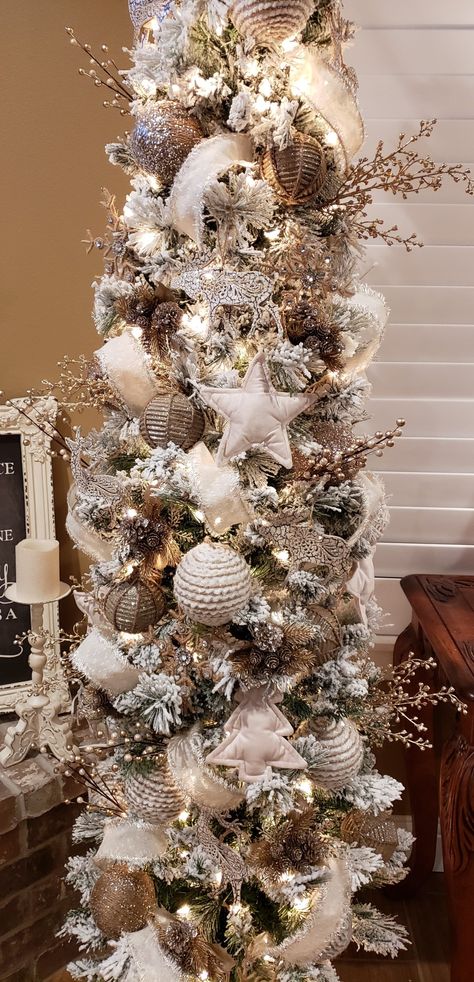 Glam Pencil Christmas Tree, Flocked Tree With Green And Gold, Decorated Pencil Christmas Trees Ideas, Neutral Pencil Christmas Tree, Trendy Christmas Tree Decor Ideas 2024, White Pencil Tree Decorating Ideas, White Pencil Christmas Tree Ideas, Flocked Pencil Christmas Tree Decorated, Decorated Flocked Christmas Trees