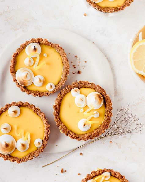 Summer in a bite, these Yuzu Lemon Tarts have a sweet salty graham cracker crust, a creamy all-natural lemon filling, and a torched meringue. Yuzu Desserts, Yuzu Dessert, Torched Meringue, Chocolate Crumble, Lemon Tarts, Cake Pan Set, Tart Filling, Tarts Crust, Baking Items