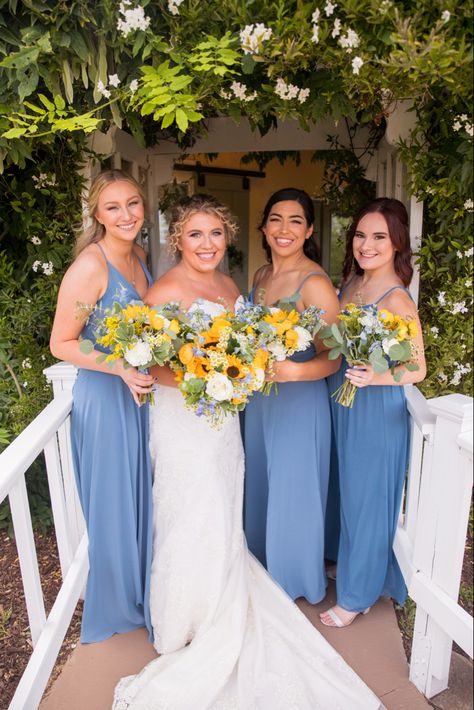 Blue Wedding Theme With Sunflowers, Blue And Yellow Country Wedding, Dusty Blue And Sunflower Fall Wedding, Sunflower Wedding Colour Palettes, Powder Blue And Yellow Wedding, Sunflower And Blue Wedding Cake, Blue Yellow Green Wedding Bridesmaid Dresses, Light Blue Sunflower Wedding, Blue And Yellow Beach Wedding