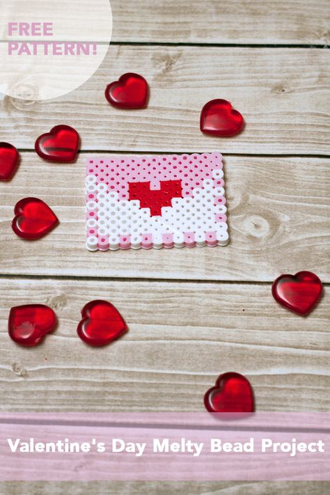 Melty Bead Valentine's Day Envelope Proiect Perler Beads Ideas Valentines Day, Perler Bead Valentine Patterns, Perler Beads Valentines Day, Valentine’s Day Perler Beads, Valentines Perler Bead Patterns, Valentines Day Perler Bead Patterns, Perler Valentines, Valentines Perler Beads, Valentines Day Pattern