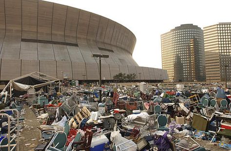 The Louisiana Superdome stands littered and deserted, except for some police, military and an occasional stray dog, Sept. 3, 2005, after Hurricane Katrina refugees staying at the Superdome evacuated New Orleans. Buses, helicopters and trains carried survivors of the storm and its chaotic aftermath to safety and more than 10,000 survivors were flown out of New Orleans as part of the largest airlift in U.S. history. CREDIT: AP Katrina Picture, New Orleans History, Southern Gothic, Crescent City, My Heritage, Cloud Gate, Stray Dog, Buses, Louisiana