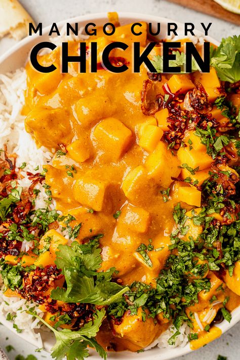 This mango chicken curry is made with tender boneless chicken and fresh ripe mangos and topped in a creamy coconut and curry sauce. Garnish it with fresh cilantro or parsley and lay it over a bed of rice or warm naan bread to soak up the flavorful sauce. Mango Chicken Curry With Coconut Rice, Mango Coconut Chicken, Mango Curry Chicken, August Meals, Curry Mango, Creamy Coconut Curry, Coconut Curry Recipe, Chicken Coconut Curry, Mango Chicken Curry