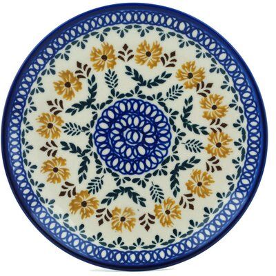 This polish pottery saucer was handmade and hand-decorated in Boleslawiec, Poland by skilled artisans according to old traditional methods. All Polish stoneware is microwave, dishwasher, freezer, and oven safe up to 480°F. It does not contain lead or cadmium. Appetizer Plates Set, Appetizer Plate, Plate Ceramic, Polish Stoneware, Pottery Plate, Golden Flower, Pottery Shop, Appetizer Plates, Garden Theme