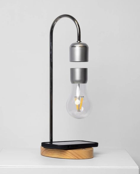 This remarkable lamp not only illuminates your space with a gentle, warm glow but also astonishes with its unique levitating light bulb, held aloft by the power of magnets. The magic extends beyond mere levitation. Hidden within the lamp’s base is a powerful wireless phone charger, discreetly blending technology with function. 🔍 Product: Levitating Lamp (Wireless Charger) 👆 Tap the link in bio for more lamps! . . . . . . . . . . . . . . . . . . #decorcrushing #interior4u #interior4inspo #sa... Levitating Lamp, Mood Light, Unique Lamps, Modern Accents, Accent Lighting, Phone Charger, Diffused Light, Chandelier Pendant Lights, Showcase Design