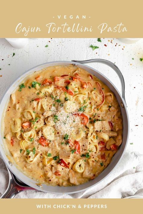 The Vegan Cajun Tortellini Pasta is quick and easy and perfect for weeknight dinners since it’s ready in under 30 minutes. Vegan chicken, dairy-free tortellini, and sauteed peppers all coated in a creamy, melt-in-your-mouth, seasoned cajun sauce. This hearty pasta is brimming with bold and zesty flavors, and it’s completely customizable, making it a great addition to your recipe rotation! Cajun Tortellini, Vegan Meatloaf Recipe, Chicken And Peppers, Creamy Cajun Pasta, Vegan Cajun, Vegan Meatloaf, Cajun Sauce, Pasta With Chicken, Homemade Cajun Seasoning