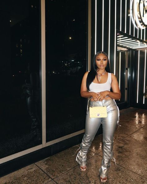 Black And Silver Baddie Outfit, Black And Silver Outfits Black Women, Silver Top Outfit Black Women, Chrome Party Outfits, White And Silver Outfit Black Women, Metallic Concert Outfit, Black And Silver Concert Outfit, Metallic Pants Outfit Black Women, Sliver Outfit Ideas