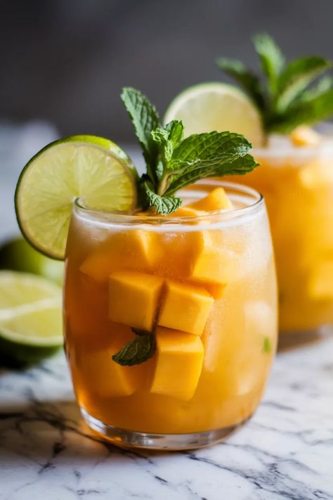 A photo of a  Dry January Mango Mule a Mocktail Recipes for Dry January Mocktail With Ginger Beer, Mango Mule, Mango Mocktail, Best Mocktail, Refreshing Mocktail, Alcohol Free Drinks, Mocktail Recipes, Dry January, Tropical Twist