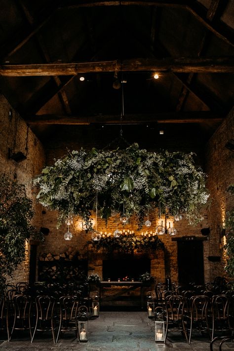 Foliage Chandelier Wedding, Earthy Floral Wedding, Wedding With Lots Of Greenery, Hanging Foliage Wedding, Indoor Woodland Wedding, Rustic Modern Wedding Venues, Dark Earthy Wedding, Greenhouse Wedding Decor, Indoor Wedding Venue Ideas