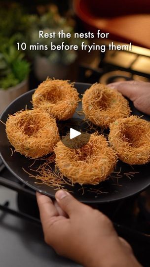 1.1M views · 67K reactions | •PERFECT PARTY SNACKER- BIRD’s NEST RECIPE•😍 This might be your perfect fancy party snacker to impress your guets🙈! A pure veg bird’s’ nest snack- the base is a flavourful potato mixture with crisp vermicelli along with soft melt in mouth Paneer balls🤤  Ingredients used are- For Potato mixture- Boiled potatoes- 4 medium size Boiled peas- 1 cup Capsicum- 1 medium size Grated paneer- 100-150 grams Chopped garlic- 1 Tbsp Red chilli powder- 1 Tbsp Haldi- 1 Tsp Jeera powder- 1 Tsp Chaat masala- 1 Tsp Chopped green chillies- 2 pieces Salt to taste  Make katori like shapes with light hands. You may spread some oil on your palms while doing this process! Makes it quite easy. After giving the shape, rest these for 10 mins.  Meanwhile, for paneer balls- Paneer (grated Birds Nests Recipe, Paneer Snacks, May Spread, Delhi Food, Schezwan Sauce, Potato Snacks, Chaat Masala, Taste Made, Boiled Potatoes