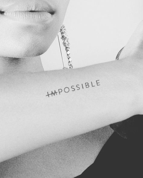 Everything is possible Phrase Tattoos Placement Arm, Perspective Tattoo Cursive, Impossible Tattoo, Raison Detre Tattoo, Patience Tattoo Justin Bieber, Side Wrist Tattoos, Cursive Tattoos, Aesthetic Tattoo, Word Tattoos