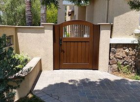 Courtyard Gate, Courtyard Restaurant, Gate Ideas, Entrance Ideas, Wrought Iron Gate, Wood Gate, Front Courtyard, Laguna Niguel, Entry Gates