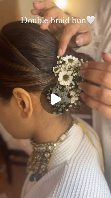 pratiksha NP on Instagram: "“Double braid bun “ in the making 🤍

Hair: @hairbypratiksha 

#trendinghairstyles #bridalhair #bridesofinstagram #uniquehair #bridesbypratikshaverma #trendinghairstyles #haircreation #hairlove #weddingbun #indianhairstyles #weddinghairstyles #mumbaihairstylist
#bridalhairdo #bridesofsouthindia 
@wedmegood @weddingsutra @weddingbazaarofficial @thebridesofindia @witty_wedding @wedabout @weddingwireindia @weddingbazaarofficial @weddingbazaarfashion @thebridesofindia" Hair Bun With Flowers, Flower Bun Hairstyle, Flower Hair Bun, Mehndi Hairstyles, Flower Bun, Wedding Bun, Braid Bun, Bridal Hairdo, Tutorial Ideas