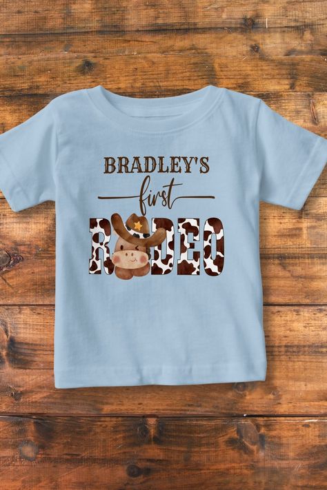 First rodeo cow pattern cute baby horse in a hat baby T-Shirt Cowboy First Birthday, Rodeo Birthday Parties, Baby Horse, Rodeo Party, Matching Family T Shirts, Boys 1st Birthday Party Ideas, Rodeo Birthday, Custom Birthday Shirts, Western Party