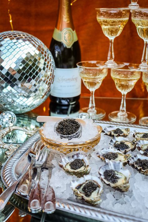 Talk about a perfect pairing! Oysters and Roe are one of our favorite pairings and a go-to treat for celebrating special occasions. Featuring California Caviar Co.'s Paddlefish Roe. Closest to old world caviar, this delicious small platinum bead has a briney mineral finish with a delicate pop. Add a dollop of this luscious and sustainable caviar on top of a freshly shucked Kumamoto Oyster for a luxurious and delicious treat. The Kumi Countdown Kit includes: 36 Hog Island Kumamoto Oysters (*oyster type may vary depending on weather) 1 oz. tin of paddlefish roe Need shucking tools? Follow these links to buy a shucking knife or glove. Prop 65 Warning: Consuming this product can expose you to chemicals including cadmium, which are known to the State of California to cause cancer, birth defects Caviar Champagne Party, Oysters And Champagne Aesthetic, Oysters And Caviar, Caviar Station Wedding, Vintage Cocktail Party Aesthetic, Caviar And Champagne Party, Champagne And Caviar Aesthetic, Caviar Bar Wedding, Champagne And Caviar Party