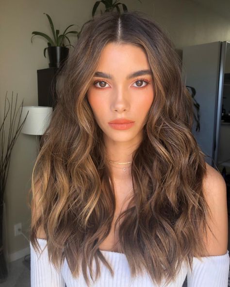 You may have heard this fancy word, “balayage,” floating around the hair-world lately, but have you been wondering what exactly balayage is? What's the difference between ombre and balayage hair? Can balayage be done at home? Read on to learn everything you need to know about the balayage hair trend. Luxy Hair Extensions, Golden Brown Hair, Brown Ombre Hair, Luxy Hair, Hair Dark, Brown Hair With Blonde Highlights, Hair Color Light Brown, Long Brown Hair, Brown Blonde Hair