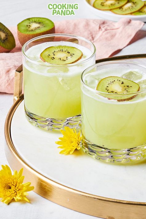 Did someone order a spring inspired gin sour recipe? This kiwi gin sour recipe is the perfect spring cocktail recipe. Sweet & Refreshing. Check out our full gin cocktail recipe here! Gin Sour Recipe, Kiwi Slice, Spring Cocktail, Spring Cocktails Recipes, Gin Sour, Star Fruit, Gin Recipes, Gin Cocktail Recipes, Gin Cocktail