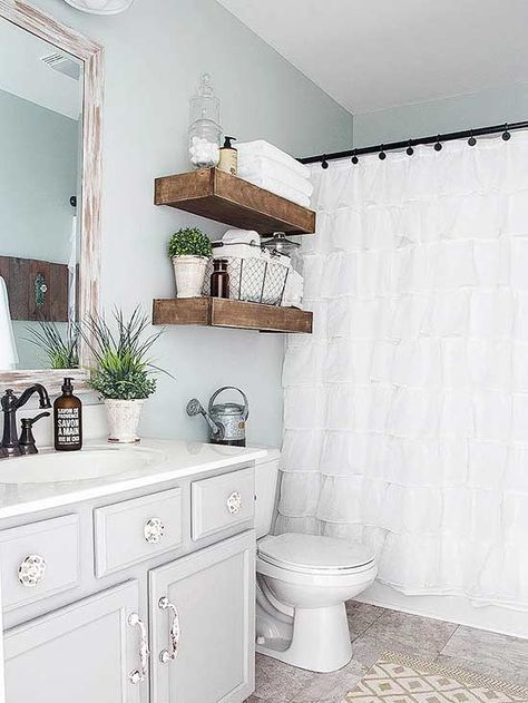 If you want to make over or remodel your bathroom, look to these cheap ideas that will totally transform the small space. Working on a budget to renovate your bathroom will be much easier thanks to these foolproof decorating ideas. Bookshelves Wood, Sherwin Williams Sea Salt, Shelves Bookshelves, Makeover Kamar Mandi, Sea Salt Sherwin Williams, Farmhouse Bathroom Decor Ideas, Bad Inspiration, Modern Farmhouse Bathroom, Chic Bathrooms