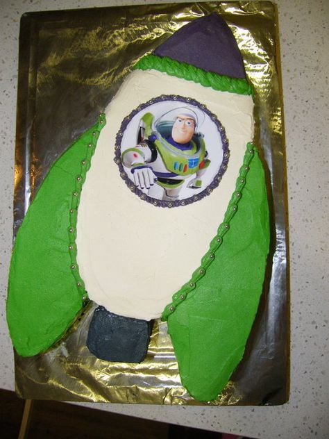 Buzz Lightyear rocket cake Buzz Lightyear 3rd Birthday Cake, Rocketship Cupcake Cake, Buzz Lightyear Cupcake Cake, Spaceship Cake, Buzz Birthday, Buzz Lightyear Cake, Lightyear Cake, Buzz Lightyear Birthday Party, Buzz Lightyear Party