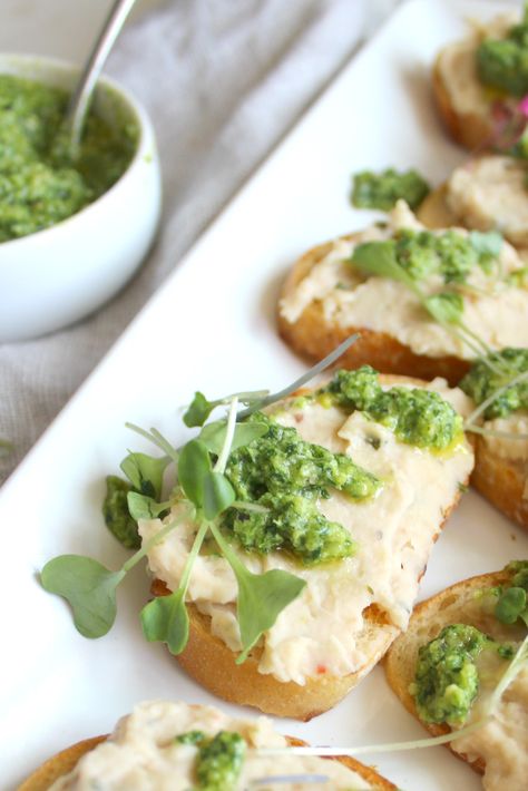 This White Bean Crostini with Pesto is savory and bright. Made with tons of fresh herbs this is sure to be the ultimate crowd pleaser | ThisSavoryVegan.com Veg Crostini Appetizers, Vegetarian Crostini Appetizers, Rustic Spinach And Bean Crostini, Sweet Pea Pesto Crostini, White Bean Crostini, Vegan Afternoon Tea, Vegan Apps, Crostini Appetizers, Vegan Italian