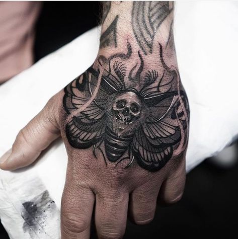 We’ve gathered 60+ moth tattoo designs for different body parts for your inspiration. Bonus: real meanings for each tattoo idea in our article. Moth Hand Tattoo Men, Moth Tattoo Hand, Geometric Hand Tattoo, Gothic Hand Tattoo, Moth Hand Tattoo, Skull Finger Tattoos, Different Styles For Men, Moth Tattoos, Dove Tattoo Design