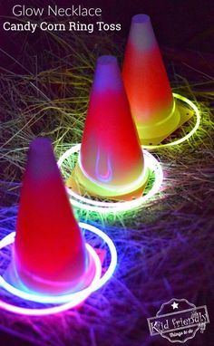 Easy DIY Candy Corn Ring Toss with Glow Necklaces for a Fun Fall, Halloween, or Thanksgiving Game - perfect for kid's school party, harvest parties, or family fun! www.kidfriendlythingstodo.com Candy Corn Ring Toss, Diy Candy Corn, Easy Diy Candy, Halloween Games For Kids, Glowing Necklace, Harvest Party, Diy Thanksgiving, Ring Toss, Thanksgiving Games