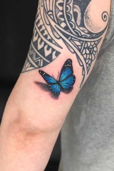 Blue Butterfly Tattoo Men, Butterfly Ocean Tattoo, Dark Blue Butterfly Tattoo, Blue Tattoos On Brown Skin, Blue Morpho Tattoo, Blue Monarch Butterfly Tattoo, Black And Blue Butterfly Tattoo, Blue Morpho Butterfly Tattoo, Morpho Butterfly Tattoo