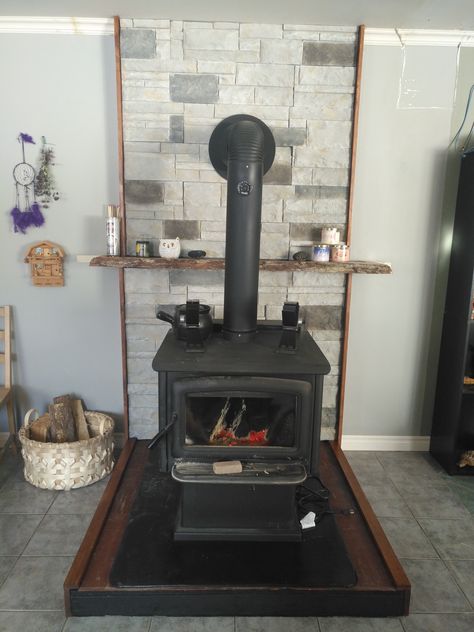 Updated our woodstove backdrop - Versetta stone, DIY easy install, live edge maple mantel. Mantel Over Wood Stove, Diy Mantle Shelf, Stove Mantle, Versetta Stone, Diy Mantle, Stone Diy, Mantle Shelf, Farmhouse Ideas, Easy Wall