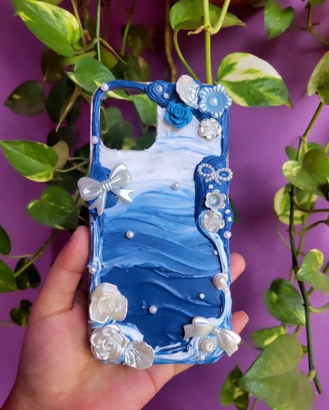 Decoden phone case Iphone 12 pro Theme: Blue + White baroque theme DM to get yours🌷 . . . . Decoden,decoden phone case,customised phone cover,decoden,diy,phone case Bangladesh, phone cover, iphone, decoden diy,cream glue phone case . . . #diy #decodenphonecase #decodendaily #stationerybangladesh #stationeryhut #journalinspiration #decodenphonecover #decodenphonecasediy #decoden #phonecoverbangladesh #customisedcovers #customisedphonecase #stationeryhut #smallbusinessowners #smallbusiness #... Decoden Inspiration, Cream Glue Phone Case, Decoden Diy, Customized Phone Covers, Cream Glue, Diy Cream, Blue Phone Case, Decoden Phone Case, Customised Phone Case