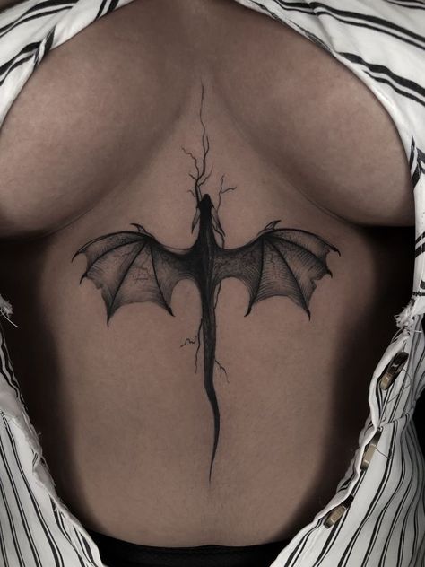 You know what's worse than having a messed up tattoo design on your skin forever? Getting called out about that epic fail online. Dragon Tattoo On Chest Women, Dragon On Stomach Tattoo, Tattoo Ideas Female Back Spine Dragon, Chest Tattoo Female Dragon, Dragon Spinal Tattoo, Dragon Lower Back Tattoo, Sternum Dragon Tattoo, Dragon Tattoo Sternum, Dragon Sternum Tattoo Women