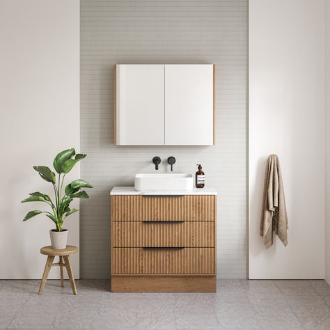 Vanity Collection | Emmett Building on the Elwood’s popularity, the Emmett takes it a step further with stacked drawers for enhanced storage. This sleek, contemporary design with a fluted front adds a touch of coastal flair to your bathroom without overwhelming the space. 📌Product info: - 20mm SilkSurface slab top with above counter basin/s - 6 cabinet options - 3 handle options Visit us today or reach out to our team to start customizing your dream vanity! #vanity #vanitymelbourne #luxu... Bathroom Vanity 900mm, Timber Benchtop, Dream Vanity, Floor Standing Vanity, Free Standing Vanity, Counter Basin, Cabinet Options, Standing Vanity, Cabinet Finishes