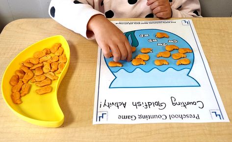 Today kids participated in counting goldfish activity . We also talked about some people have fish for pets that they keep in fish bowls or aquarium. Next, we showed them crackers and asked ,What do these crackers look like ? Yes they look like fish 🐟 invited children to count the crackers .In the end ,they also enjoyed the crackers as a snack. Read a book "One Fish ,Two fish and enjoyed singing along song " I'm a Little Fishy " they also had coloring activity . Fish Bowl Craft, Gold Fish Bowl, Bowl Craft, Fish Crackers, Preschool Counting, Fish Bowls, Goldfish Bowl, Sing Along Songs, One Fish Two Fish