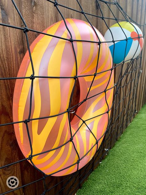 Pool toy hack 🏊🏻‍♀️ Have a fence? You can do this! #fence #backyardspace #pooltoys #pool🏊 #pooldesign #turf #bungee #goggles #floaties #pooldays #hacks #poolhacks #hooks #outdoorliving Follow my shop @MalloryKee on the @shop.LTK app to shop this post and get my exclusive app-only content! #liketkit #LTKhome #LTKswim #LTKSeasonal @shop.ltk https://liketk.it/46fD4 Hanging Pool Float Storage Ideas, Diy Pool Float Storage Ideas, Cargo Net Pool Float Storage, Diy Pool Toy Storage, Storing Pool Floats, Floatie Storage, Pool Floaties Storage Ideas, Pool Toys Storage Ideas, Pool Storage Ideas For Floats