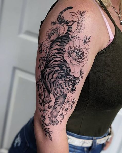 Tiger Upper Arm Tattoo Women, Floral Arm Tattoo Color, Tiger With Butterfly Tattoo, Big Tiger Tattoo, Tiger And Flowers Tattoo, Tiger Flower Tattoo, Tiger With Flowers Tattoo, Tiger Arm Tattoo, Tiger Thigh Tattoo