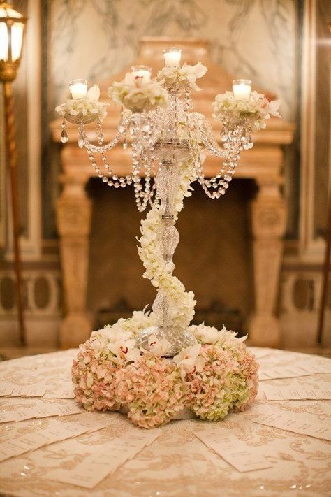 Such a lovely floral centerpiece with towering candles and hanging crystals #wedding #gatsby #centerpiece #flowers #artdeco Affordable Wedding Centerpieces, Decoration Evenementielle, 1920s Wedding, Gatsby Wedding, Victorian Wedding, Have Inspiration, Miami Wedding, Deco Floral, Affordable Wedding