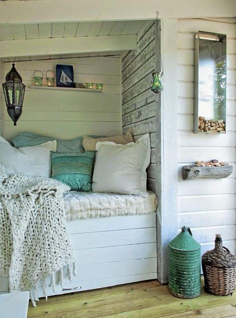 This rustic reading nook could be a great DIY project to tuck away under stairs, in an attic, or even a patio space. Beach Reading Nook, Estilo Cottage, Dream Beach Houses, Beach Cottage Decor, Beach Cottage Style, Style Deco, Design Del Prodotto, Cottage Living, Cool Ideas