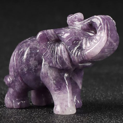 PRICES MAY VARY. Exquisite craftsmanship: This elephant statue made of Purple Lepidolite Crystal gemstone, they are carved by hand and has them unique texture, carvings may slightly vary in size, color, and shape, so you will receive a similar one as pictures shown. Healing Elephant: Crystal is the stone of universal love. It restores trust and harmony in relationships, encourages unconditional love, purifies and opens the heart at all levels to promote love, self-love, friendship, deep inner he Gemstone Figurines, Gemstone Sculpture, Crystal Statue, Hand Carved Jewelry, Lepidolite Crystals, Purple Elephant, Elephant Statue, Crystal Carving, Elephant Decor