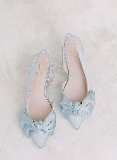 Are you a bride in search of the perfect wedding heels? Check out our blog post on these must-see designer heels of all price ranges and designer brands from Kate Spade to Jimmy Choo. Click here now to see our favorites! #wedding #shoes #heels #designershoes #weddingday #photographer #planner #bridalstyle #fineart Kate Whitcomb Wedding Shoes, Bridal Blue Shoes, Bride Shoes Wedding Heels Elegant, Coloured Bridal Shoes, Wedding Shoes Colorful, Wedding Dress With Blue Shoes, Colorful Bridal Shoes, Colourful Wedding Shoes, Classy Wedding Shoes